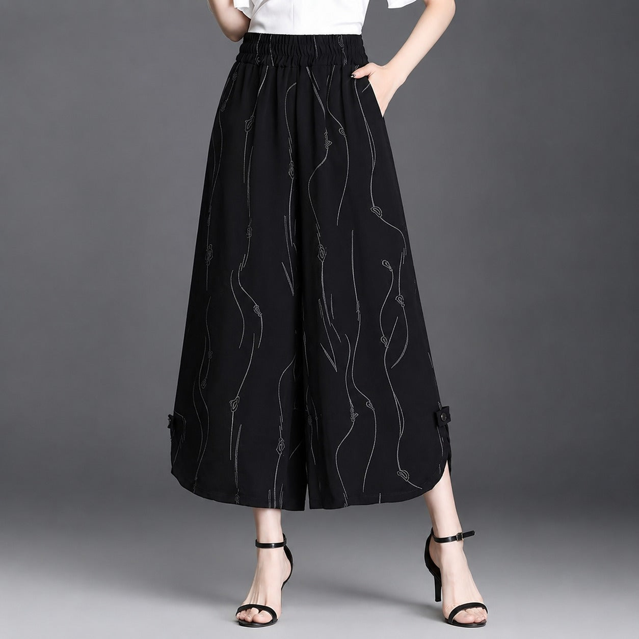 Pantalón Celiane™ con Estampado Artístico y Aberturas en el Bajo