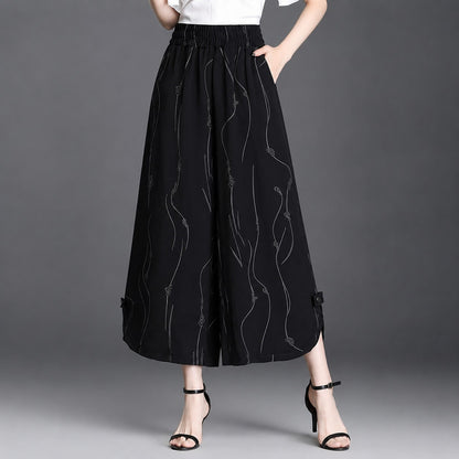 Pantalón Celiane™ con Estampado Artístico y Aberturas en el Bajo