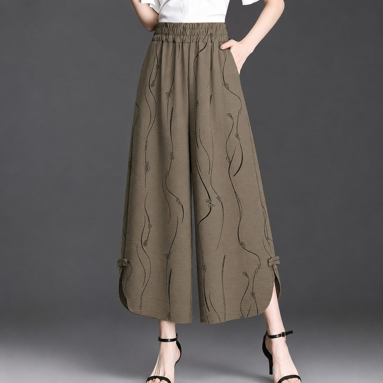 Pantalón Celiane™ con Estampado Artístico y Aberturas en el Bajo