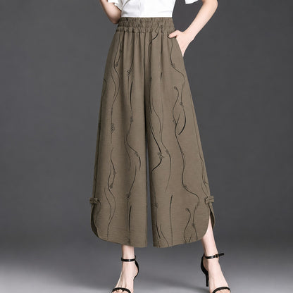 Pantalón Celiane™ con Estampado Artístico y Aberturas en el Bajo