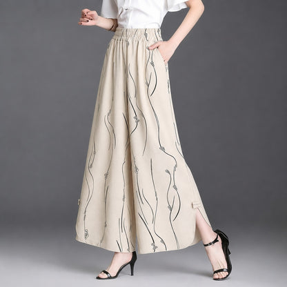 Pantalón Celiane™ con Estampado Artístico y Aberturas en el Bajo