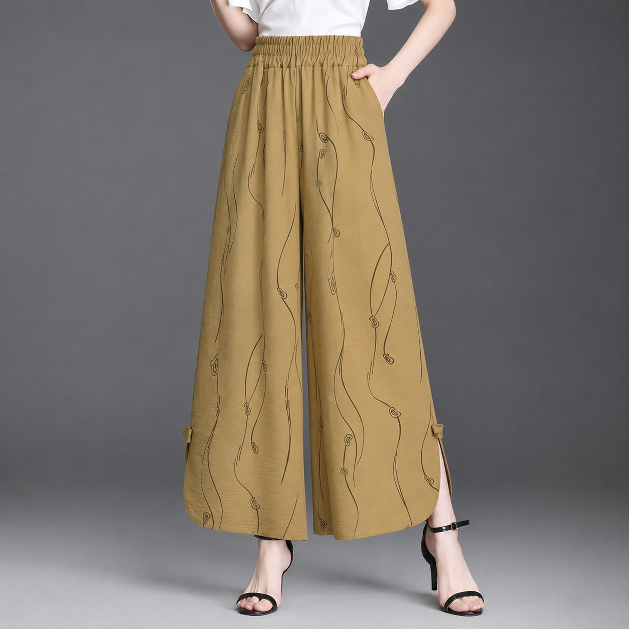 Pantalón Celiane™ con Estampado Artístico y Aberturas en el Bajo
