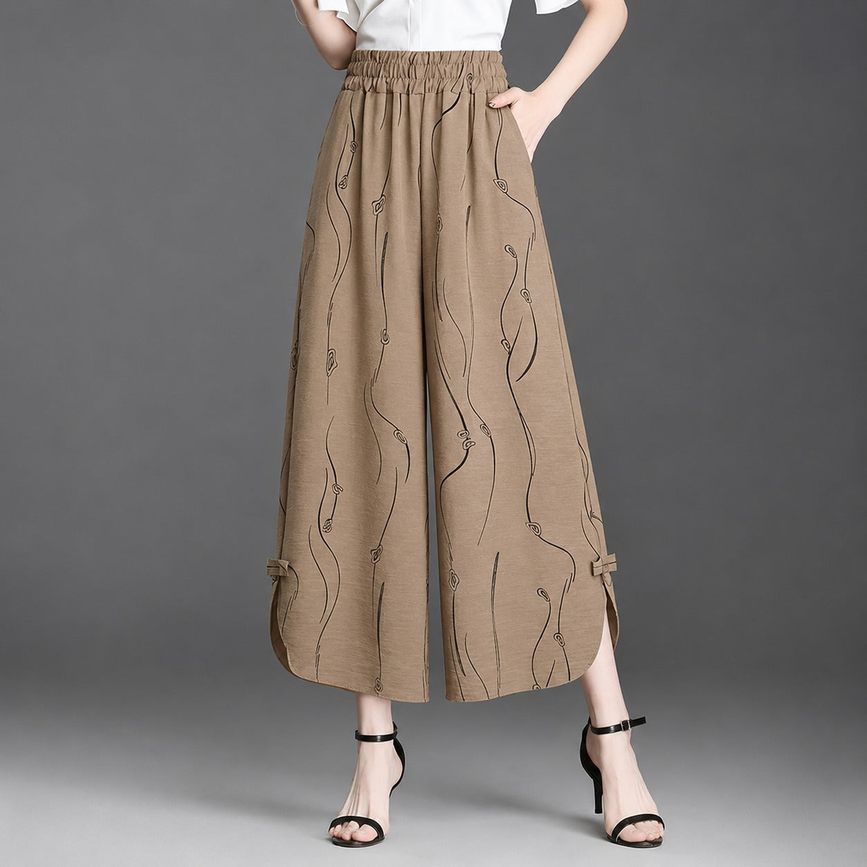 Pantalón Celiane™ con Estampado Artístico y Aberturas en el Bajo