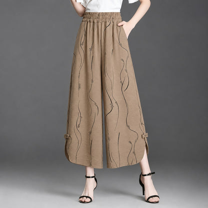 Pantalón Celiane™ con Estampado Artístico y Aberturas en el Bajo